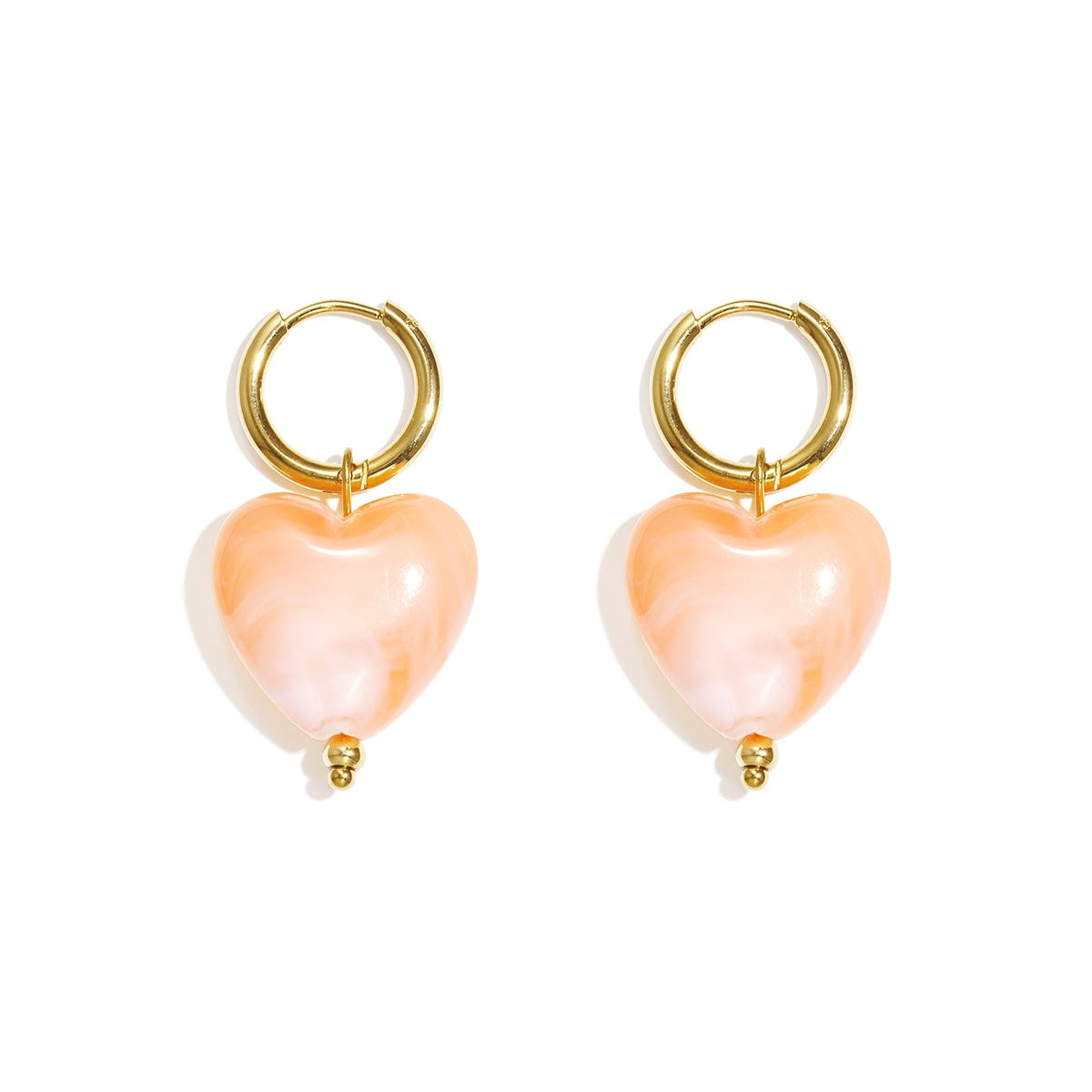 Boucles d'oreilles avec des perles en forme de cœur