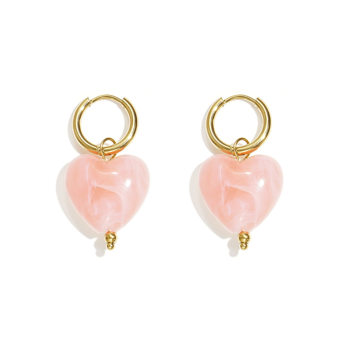 Boucles d'oreilles avec des perles en forme de cœur