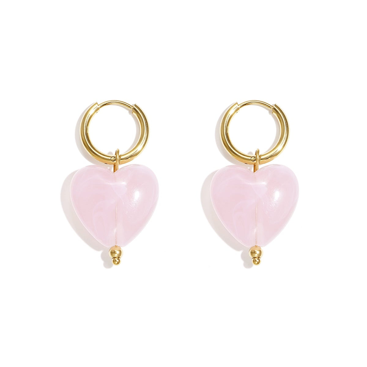 Boucles d'oreilles avec des perles en forme de cœur